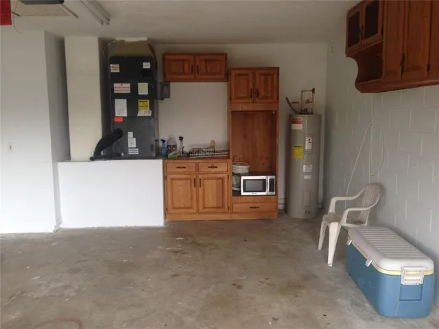 a kitchen with stainless steel appliances a refrigerator and stove