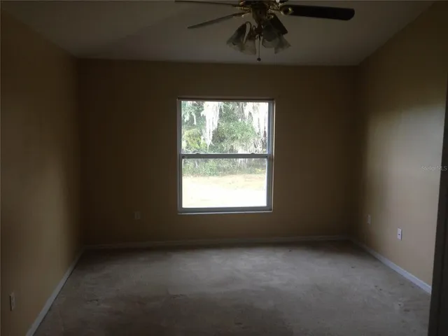 an empty room with a window