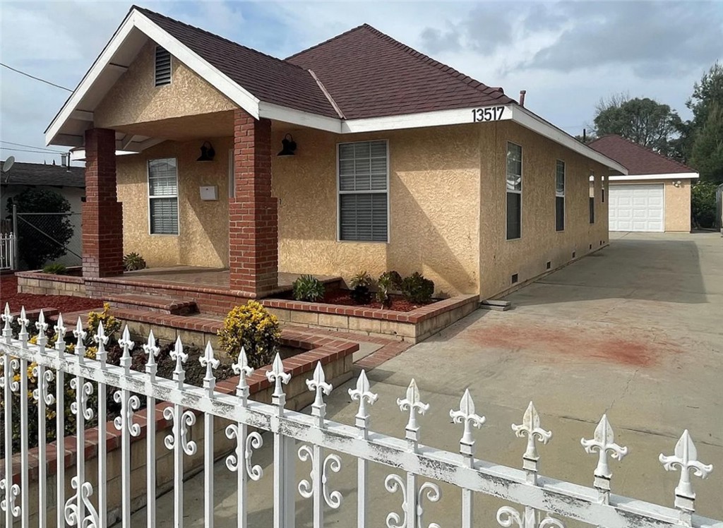 13517 Franklin Street Whittier, CA 90602 - Photo 2 of 22 a front view of house with yard