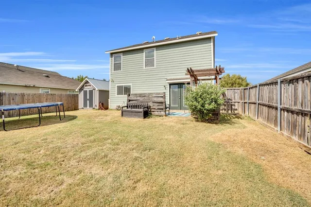 a view of a terrace with chairs