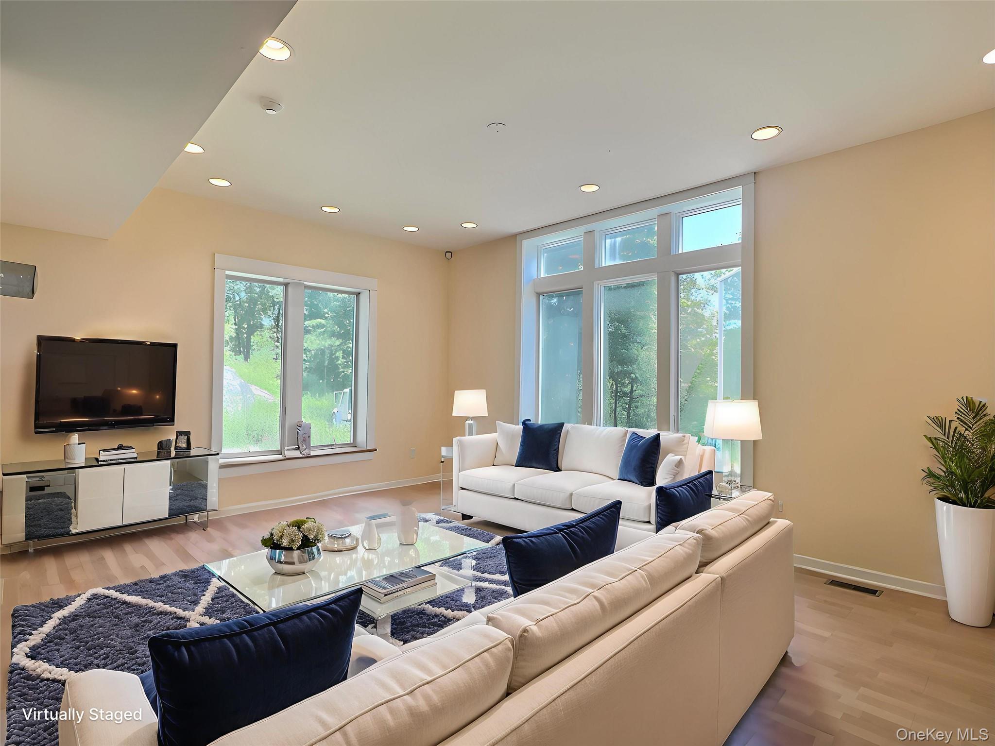 118 Scenic Ridge Drive Brewster, NY 10509 - Photo 12 of 50 a living room with furniture and a flat screen tv