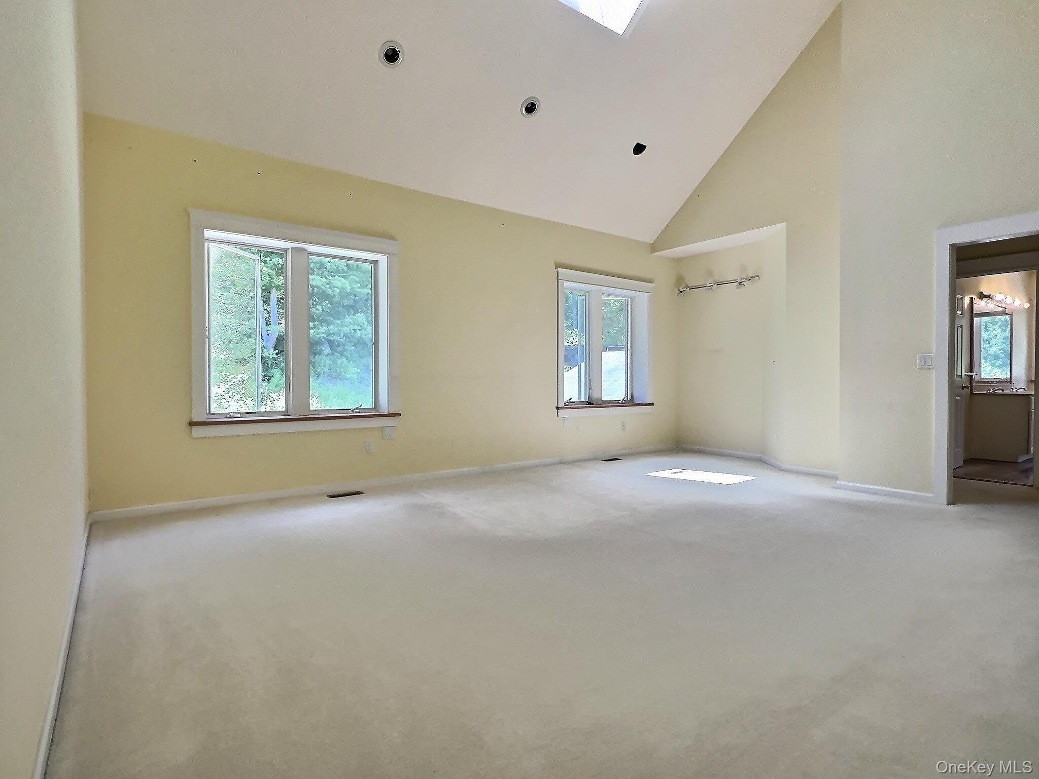 118 Scenic Ridge Drive Brewster, NY 10509 - Photo 20 of 50 a view of an empty room with windows