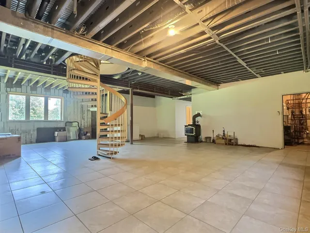 a bathroom with a sink a toilet and bathtub