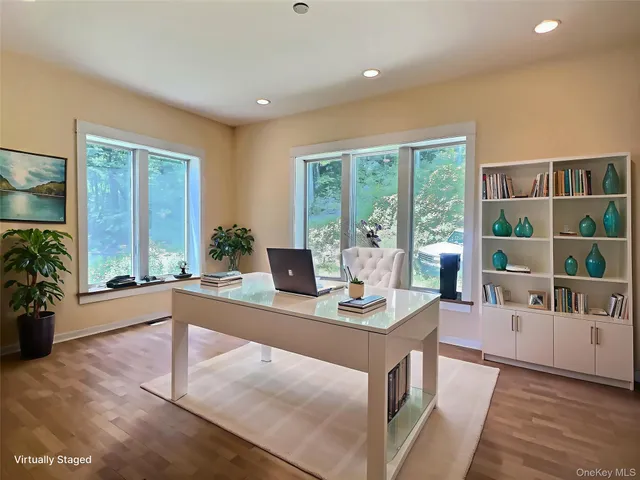 a view of kitchen with stainless steel appliances granite countertop sink stove and cabinets