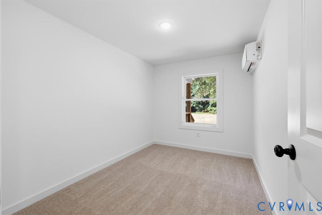 15221 Wright Road Amelia Court House, VA 23002 - Photo 15 of 22 Neutral wall colors, recessed ceiling lighting, li