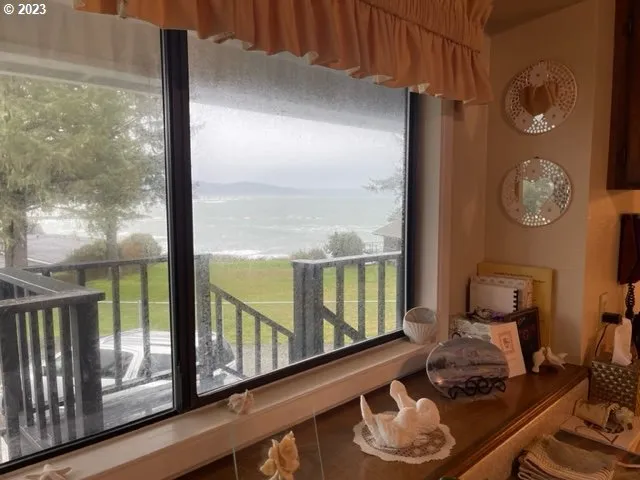 a room with furniture and a large window