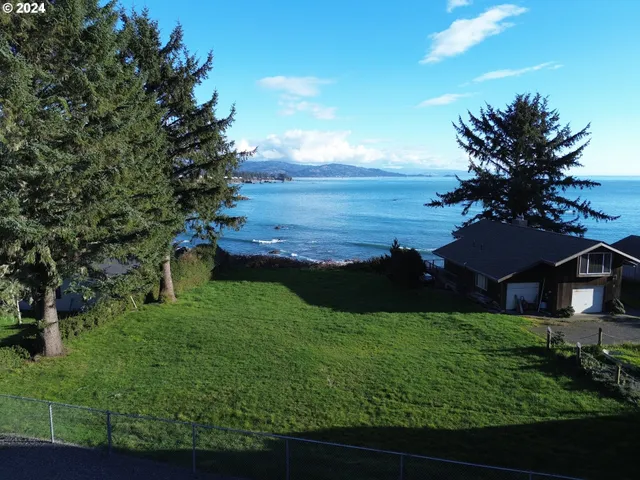 a view of a big yard with an outdoor space