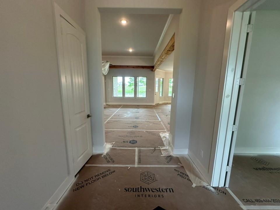410 Cobb Road Leonard, TX 75452 - Photo 4 of 24 Interior doorway featuring white trim and a recessed ceiling light