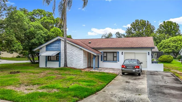a house view with a garden space
