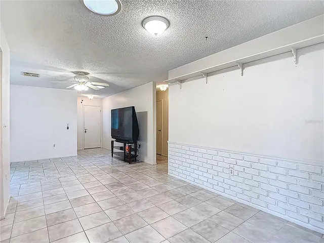 a view of a livingroom with furniture
