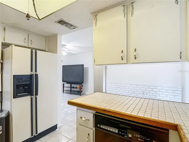 a kitchen with a stove and a microwave