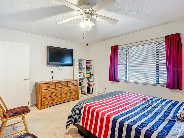 a bathroom with a shower and toilet