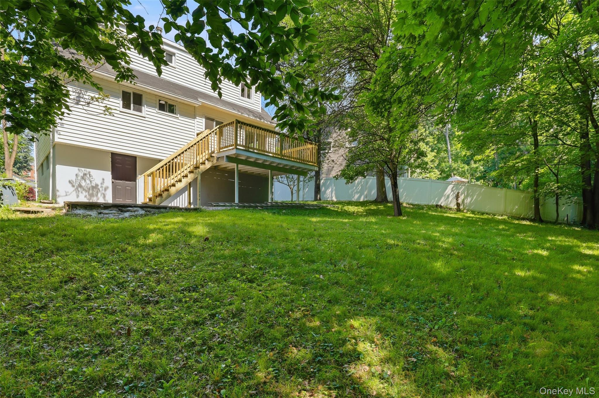 24 Fuller Road Ossining, NY 10562 - Photo 39 of 48 a front view of house with yard and green space