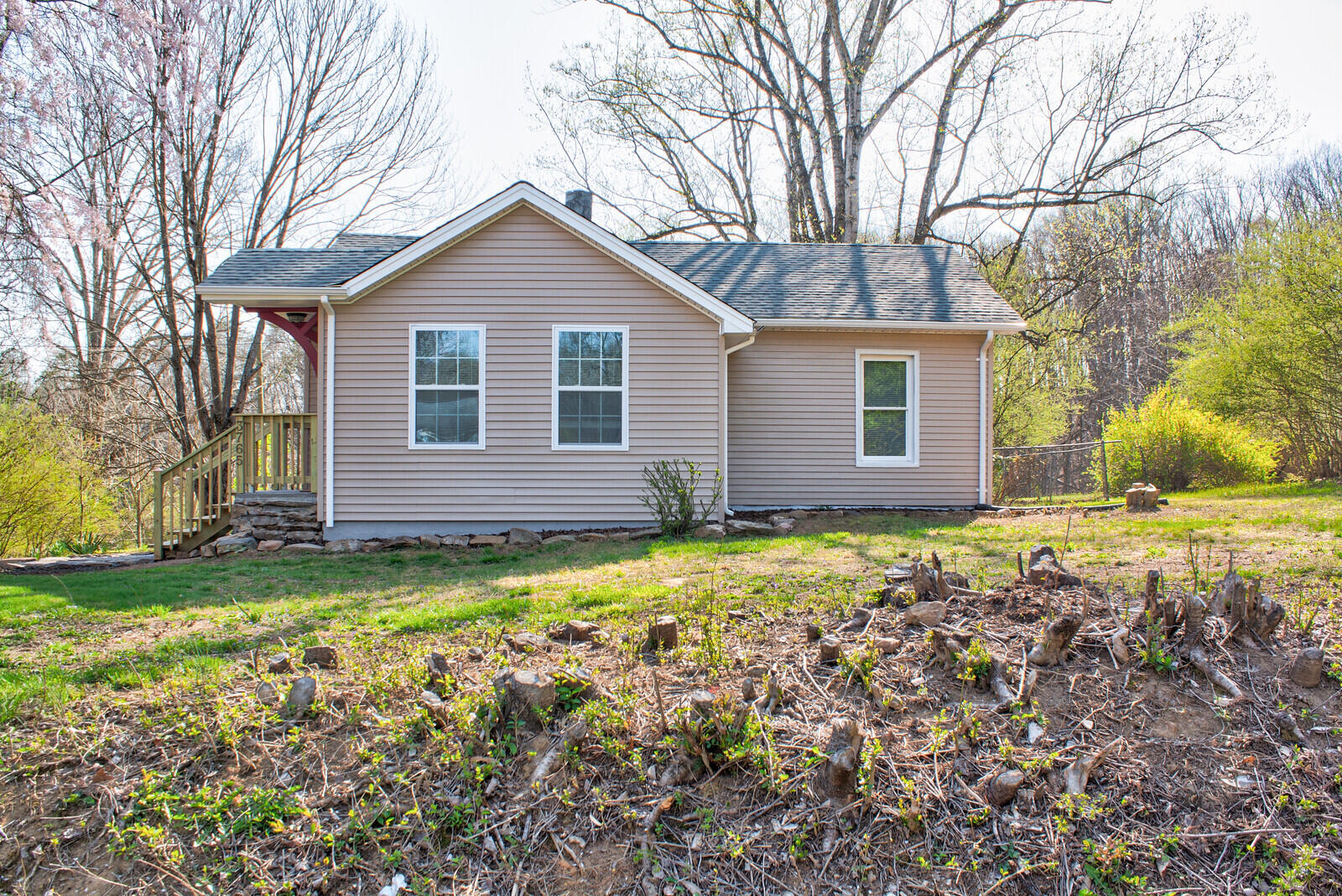 3765 Rutrough Road Southeast Roanoke, VA 24014 - Photo 22 of 25 a view of a house with a yard