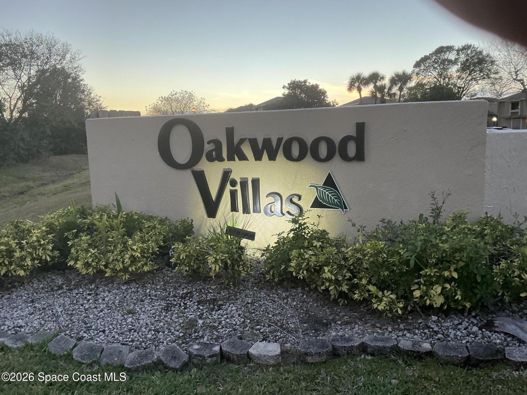 1470 Sheafe Avenue Northeast, Unit 106 Palm Bay, FL 32905 - Photo 12 of 16 a sign on the side of the road