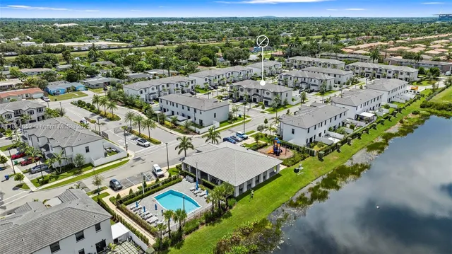 an aerial view of a city with lots of residential buildings