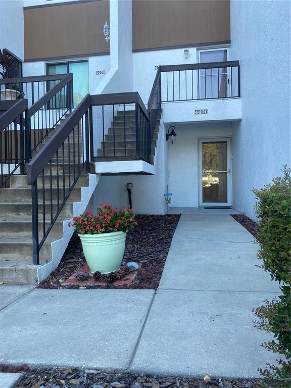 4400 Castlepalm Road Orlando, FL 32839 - Photo 2 of 38 a front view of a house with balcony
