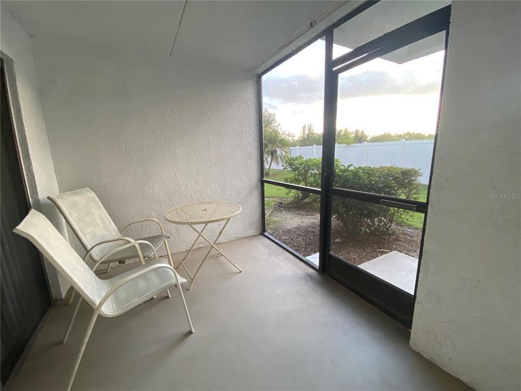 4400 Castlepalm Road Orlando, FL 32839 - Photo 24 of 38 a view of a room with gym equipment and windows