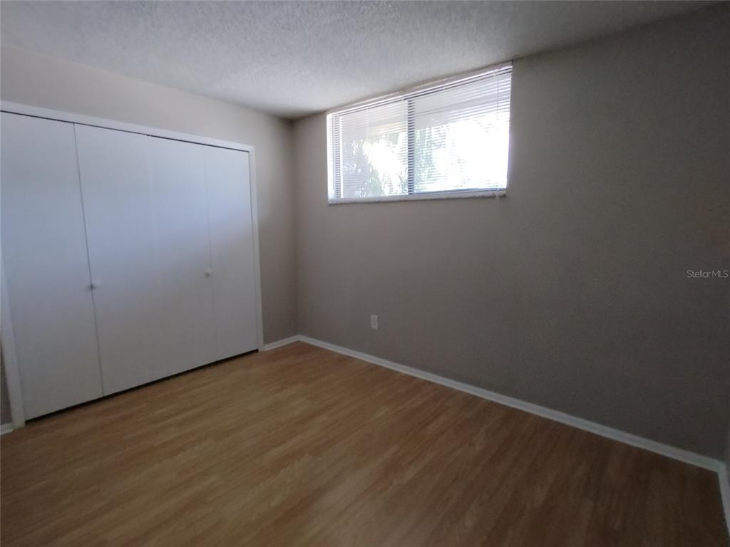 4400 Castlepalm Road Orlando, FL 32839 - Photo 9 of 38 an empty room with windows