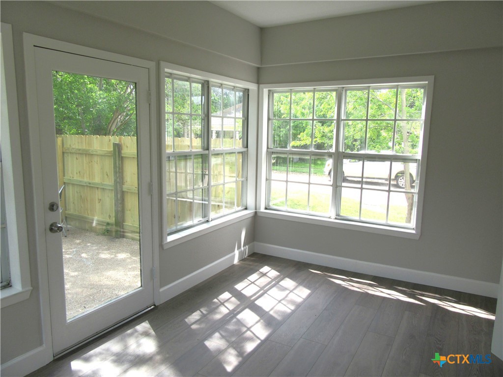 415 Easy Street Marlin, TX 76661 - Photo 20 of 45 a view of empty room with wooden floor and fan