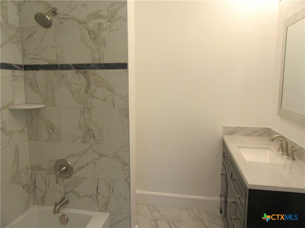 415 Easy Street Marlin, TX 76661 - Photo 23 of 45 a bathroom with a sink and vanity