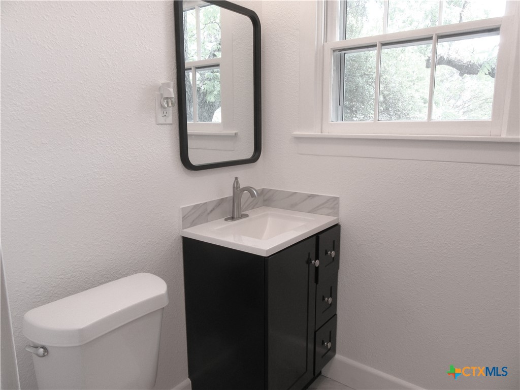 415 Easy Street Marlin, TX 76661 - Photo 27 of 45 a bathroom with a sink and a toilet