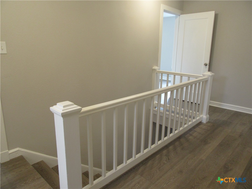 415 Easy Street Marlin, TX 76661 - Photo 34 of 45 a view of a hallway with staircase