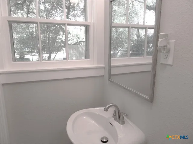 a bathroom with a window