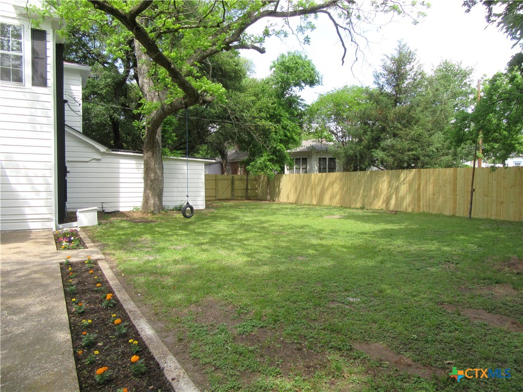 415 Easy Street Marlin, TX 76661 - Photo 39 of 45 a backyard of a house with lots of green space
