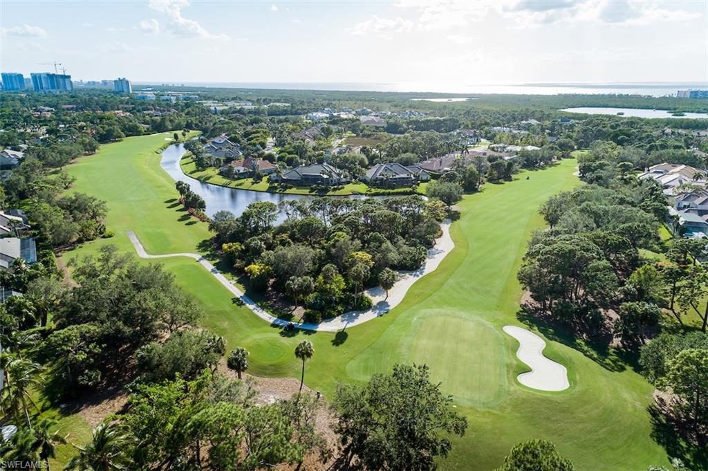 219 Cheshire Way Naples, FL 34110 - Photo 40 of 46 an aerial view of lake
