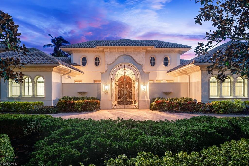 219 Cheshire Way Naples, FL 34110 - Photo 4 of 46 a large tree in front of a house
