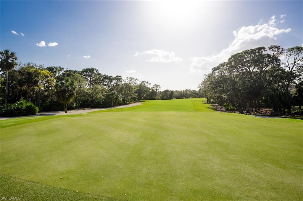 219 Cheshire Way Naples, FL 34110 - Photo 46 of 46 a view of yard with swimming pool and green space