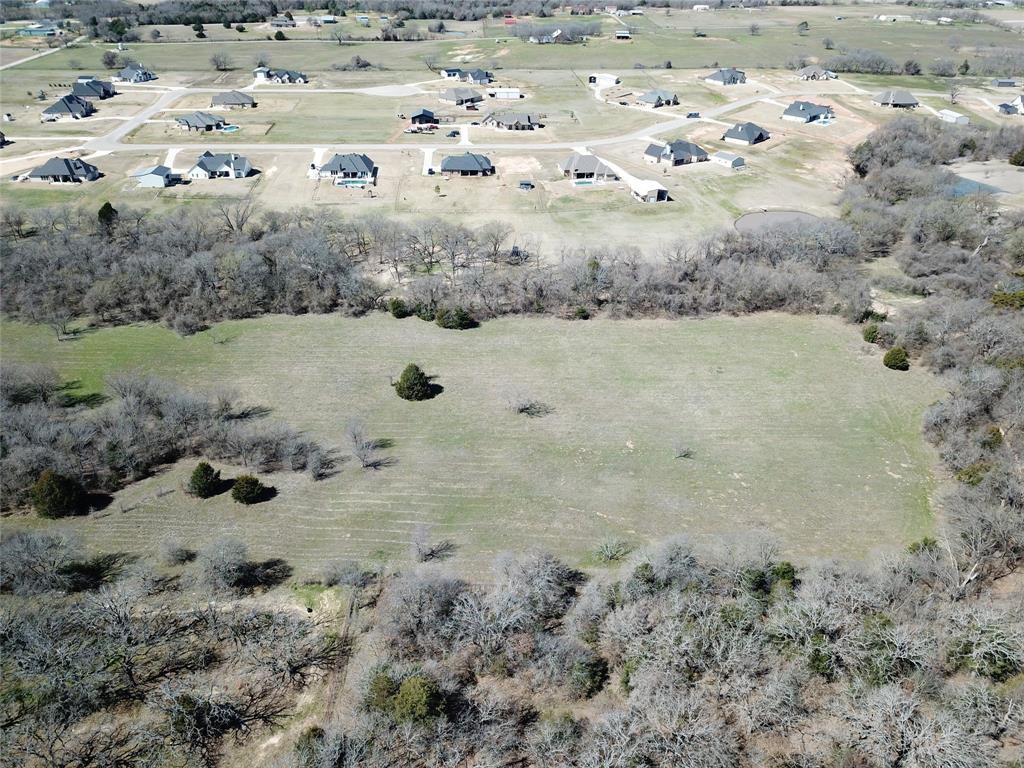 941 County Road 4270 Decatur, TX 76234 - Photo 15 of 19 a view of a dry yard covered with snow