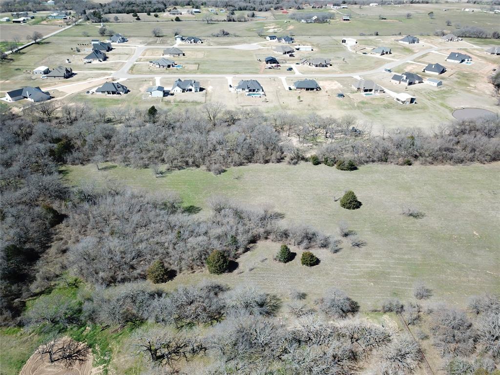 941 County Road 4270 Decatur, TX 76234 - Photo 16 of 19 a view of a dry field covered with snow