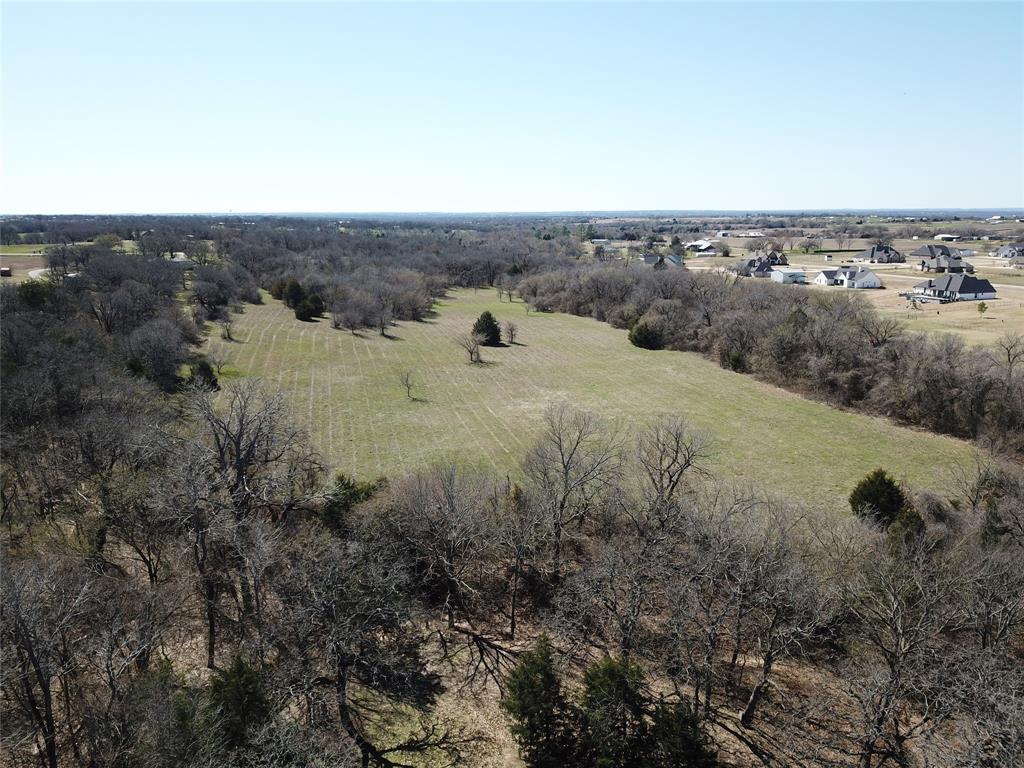 941 County Road 4270 Decatur, TX 76234 - Photo 7 of 19 an aerial view of house with yard and mountain view in back