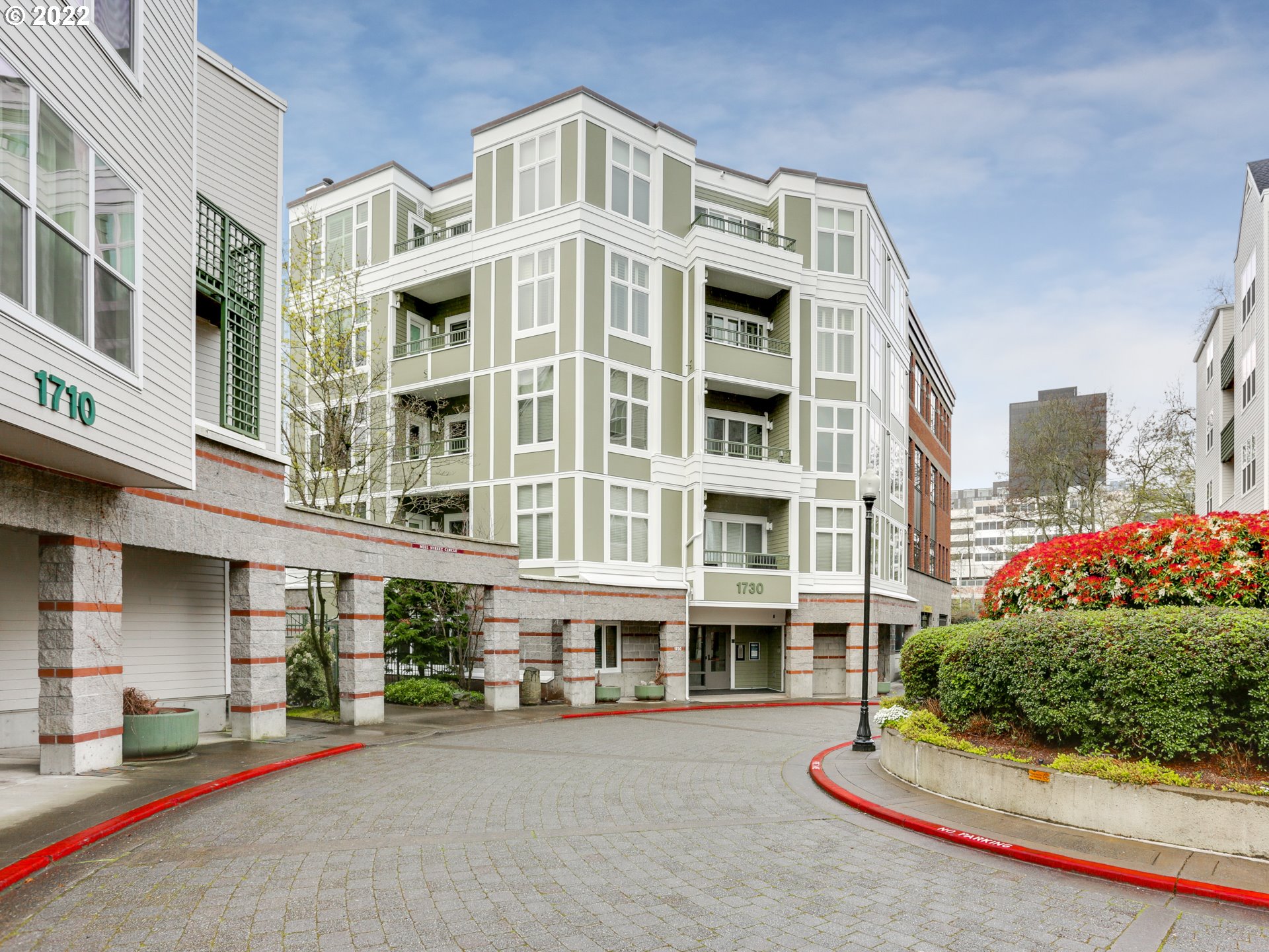 1730 South Harbor Way, Unit 405 Portland, OR 97201 - Photo 1 of 32 a front view of a multi story building