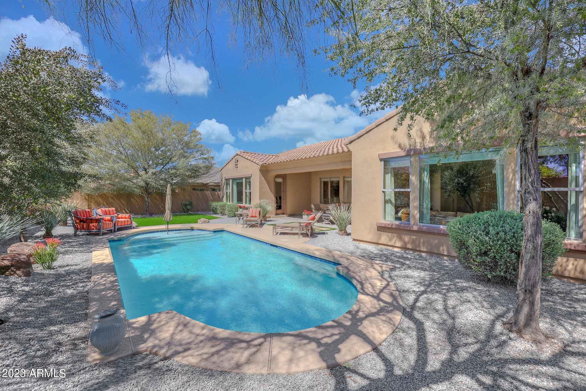 18047 West Narramore Road Goodyear, AZ 85338 - Photo 63 of 98 Full landscaped backyard
