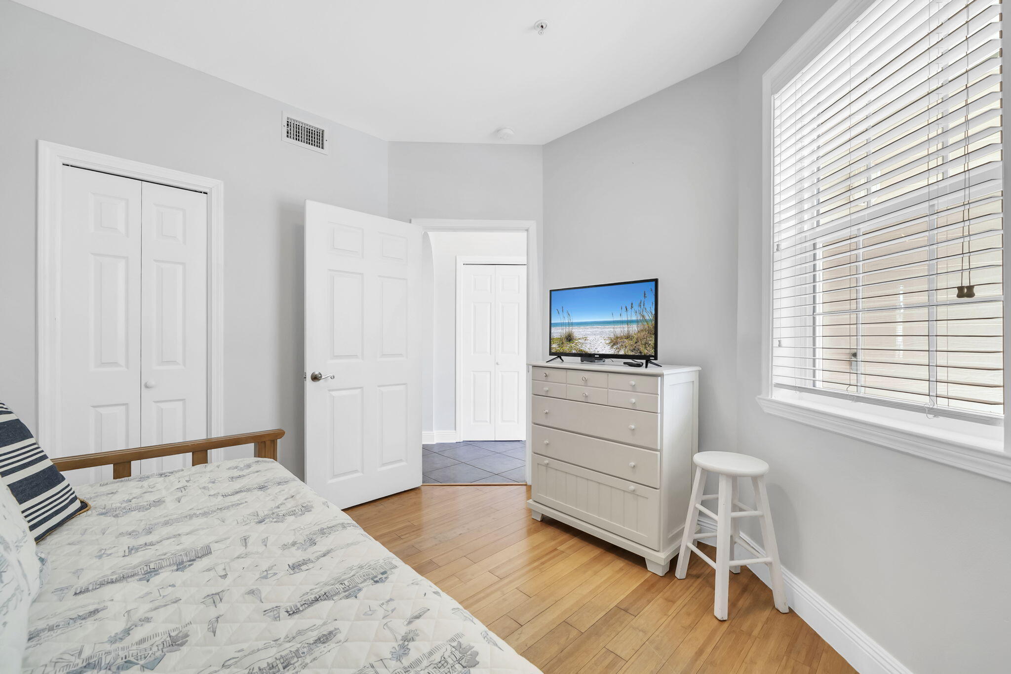 86 Village Boulevard, Unit 411 Santa Rosa Beach, FL 32459 - Photo 19 of 42 a room with a bed and a window
