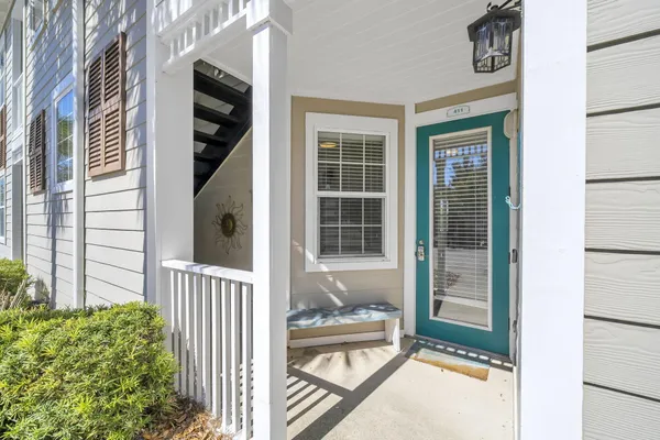 a view of a door and a window