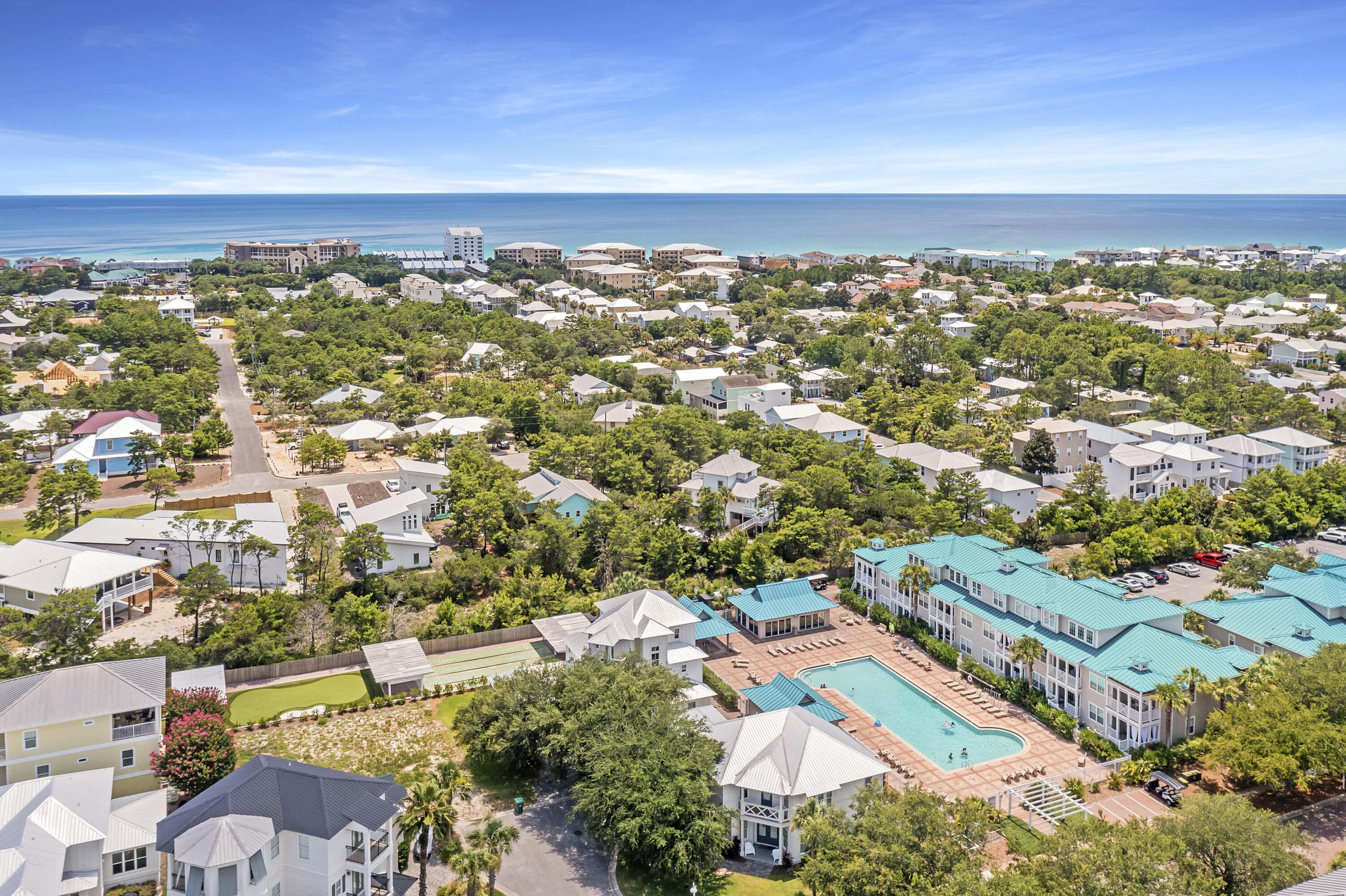 86 Village Boulevard, Unit 411 Santa Rosa Beach, FL 32459 - Photo 29 of 42 an aerial view of residential houses with outdoor space