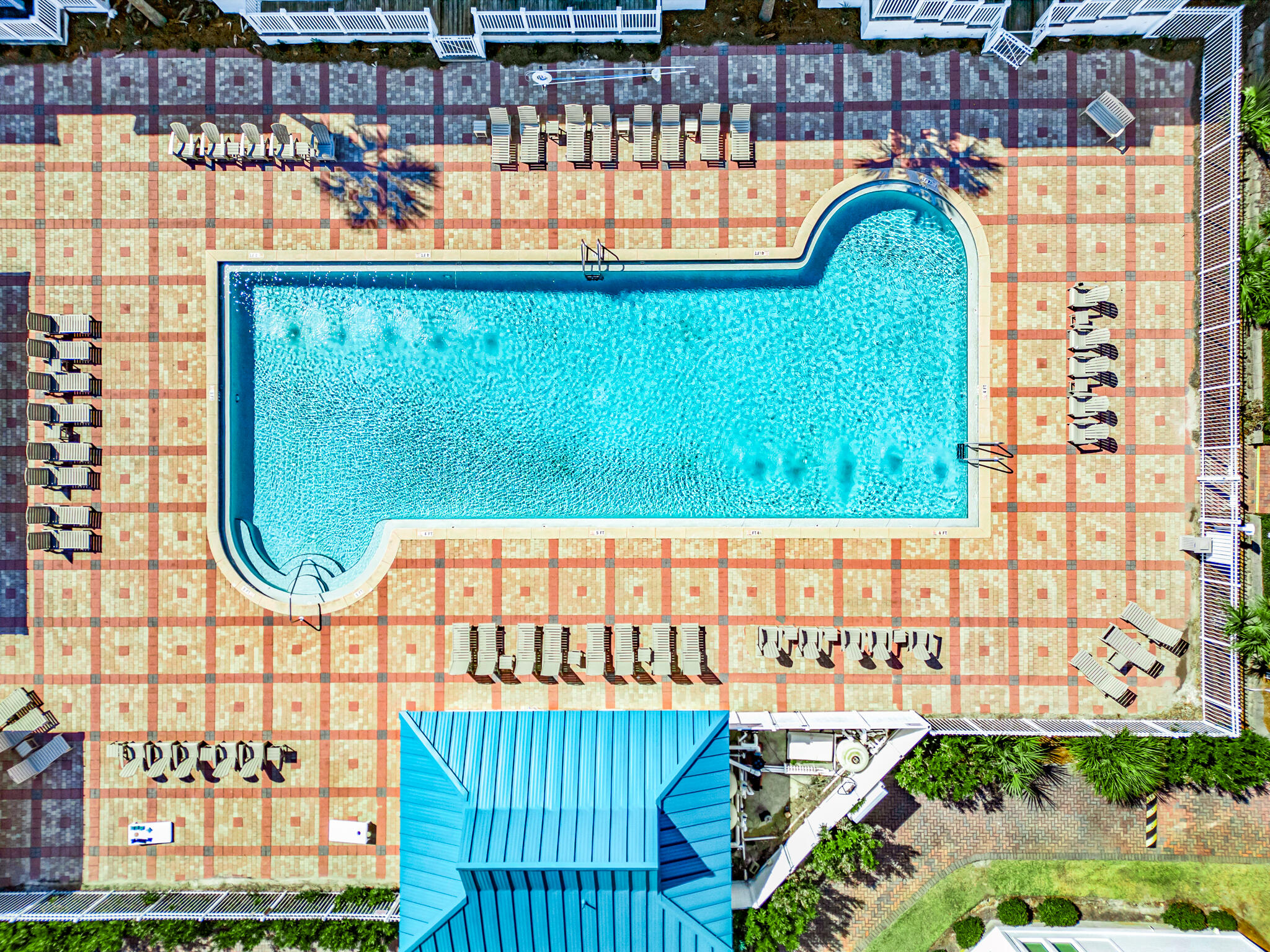 86 Village Boulevard, Unit 411 Santa Rosa Beach, FL 32459 - Photo 31 of 42 a view of swimming pool with a garden and outdoor seating