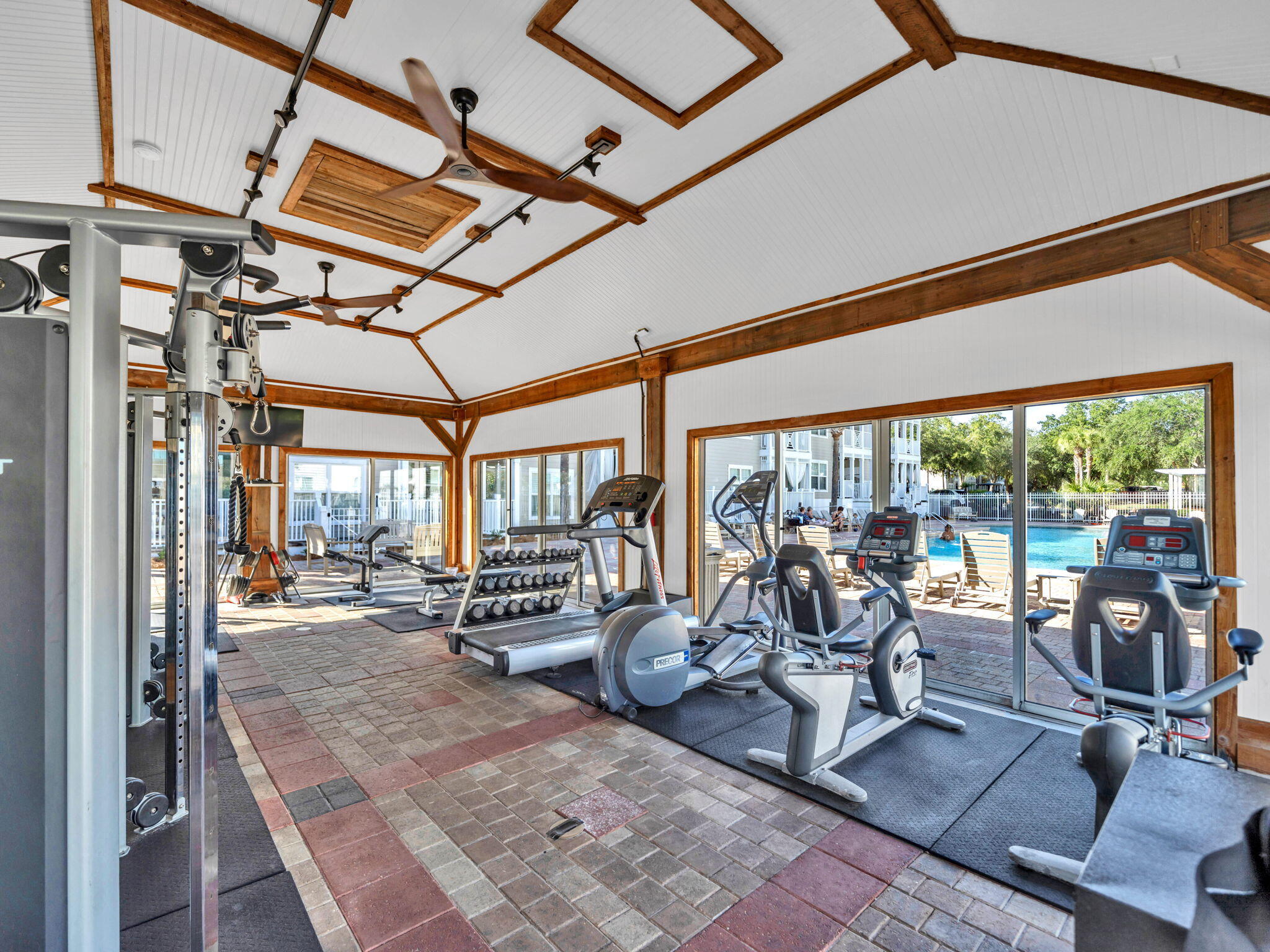 86 Village Boulevard, Unit 411 Santa Rosa Beach, FL 32459 - Photo 32 of 42 a view of a room with gym equipment and large windows