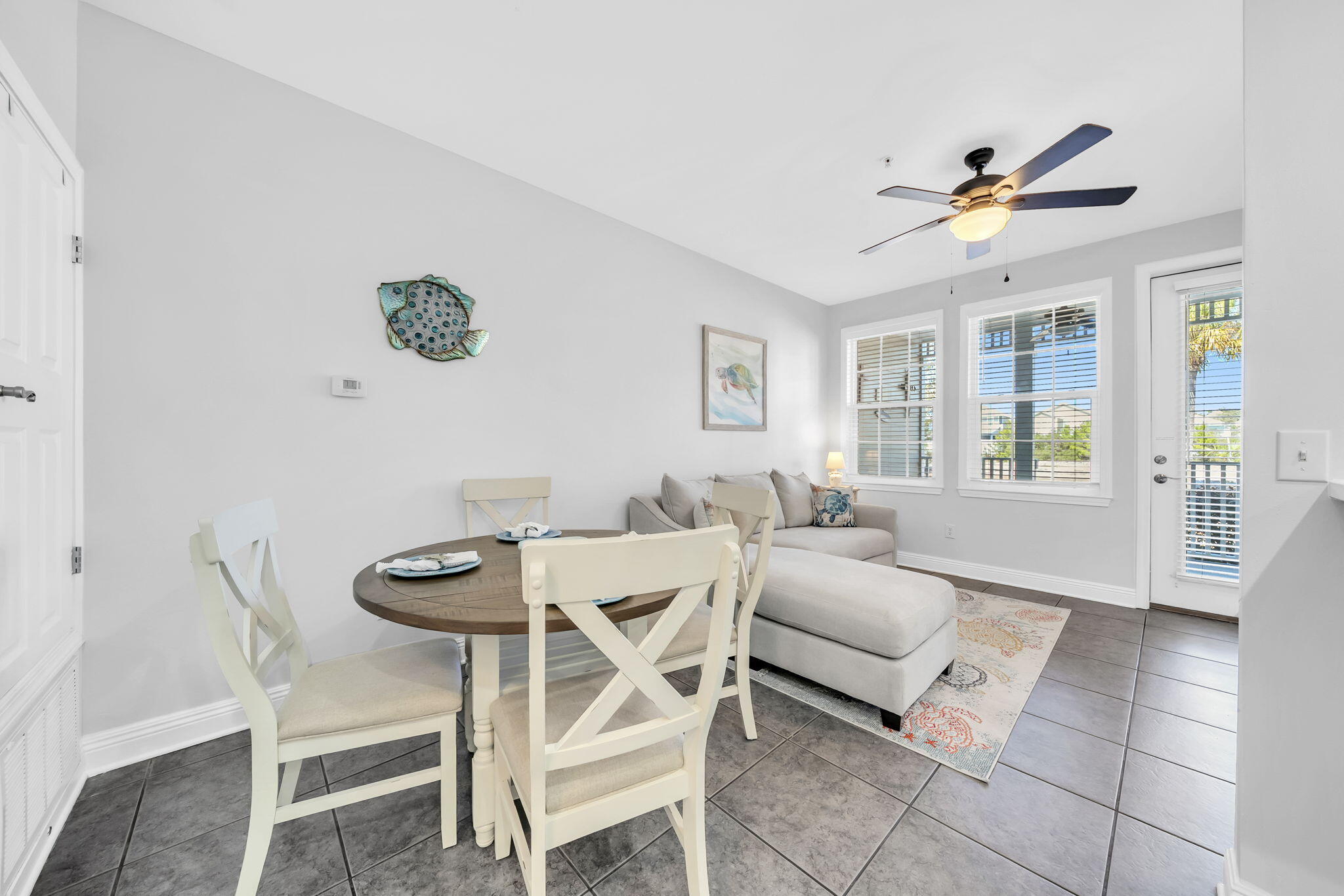 86 Village Boulevard, Unit 411 Santa Rosa Beach, FL 32459 - Photo 5 of 42 a living room with furniture and a large window