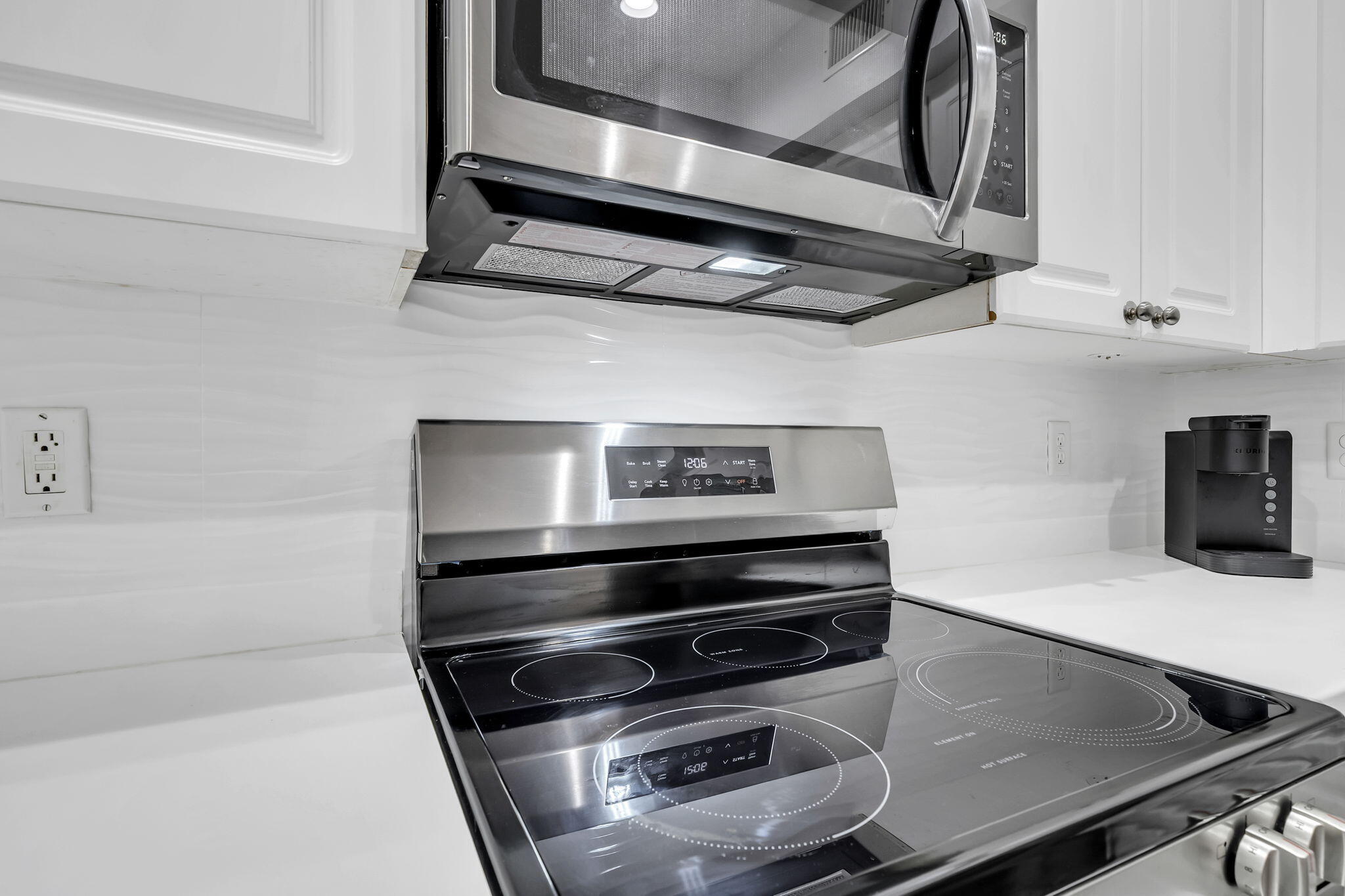 86 Village Boulevard, Unit 411 Santa Rosa Beach, FL 32459 - Photo 8 of 42 a stove top oven sitting inside of a kitchen