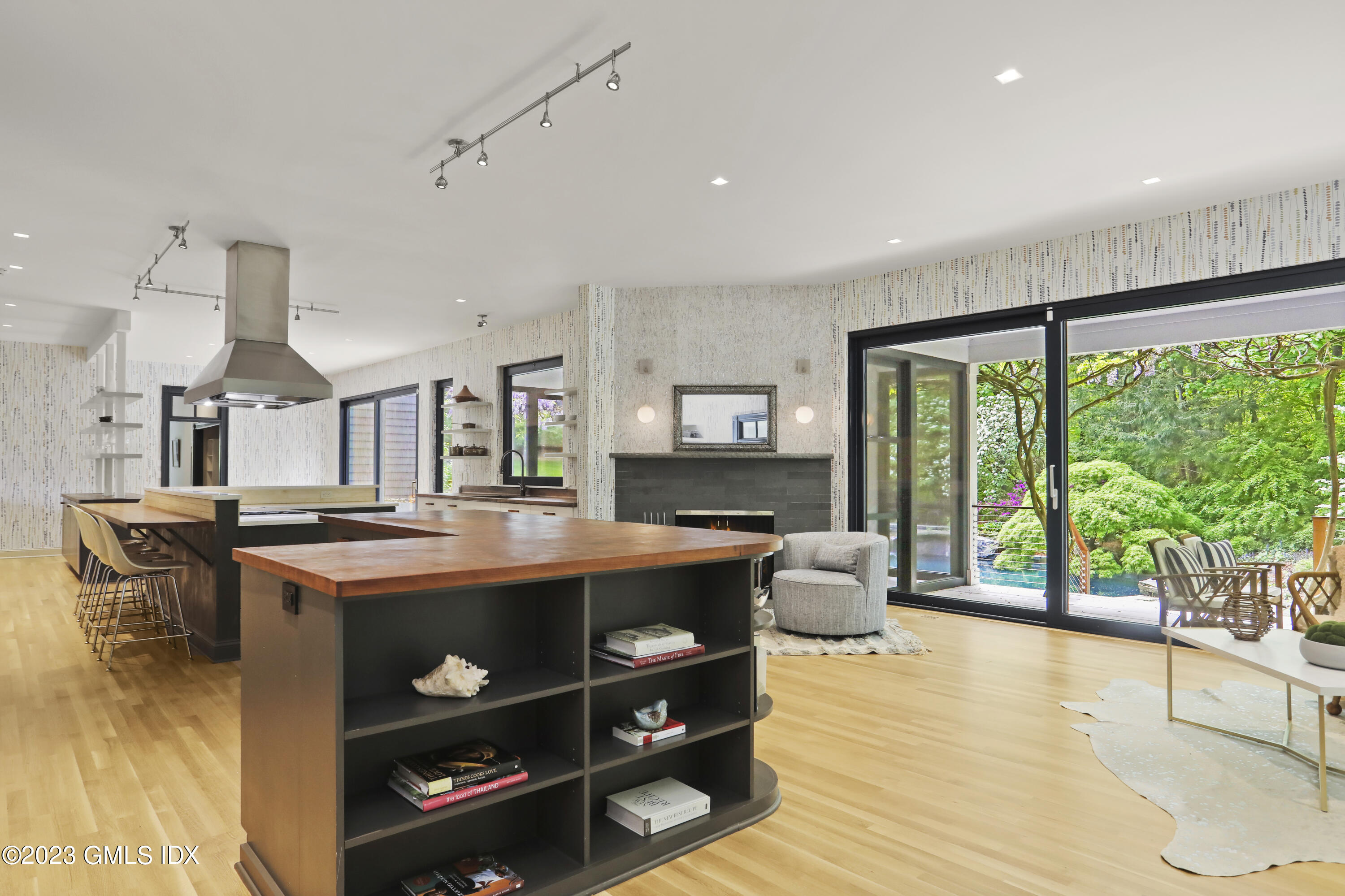 56 Dingletown Road Greenwich, CT 06830 - Photo 11 of 38 a view of a kitchen with stainless steel appliances granite countertop a stove and a large window