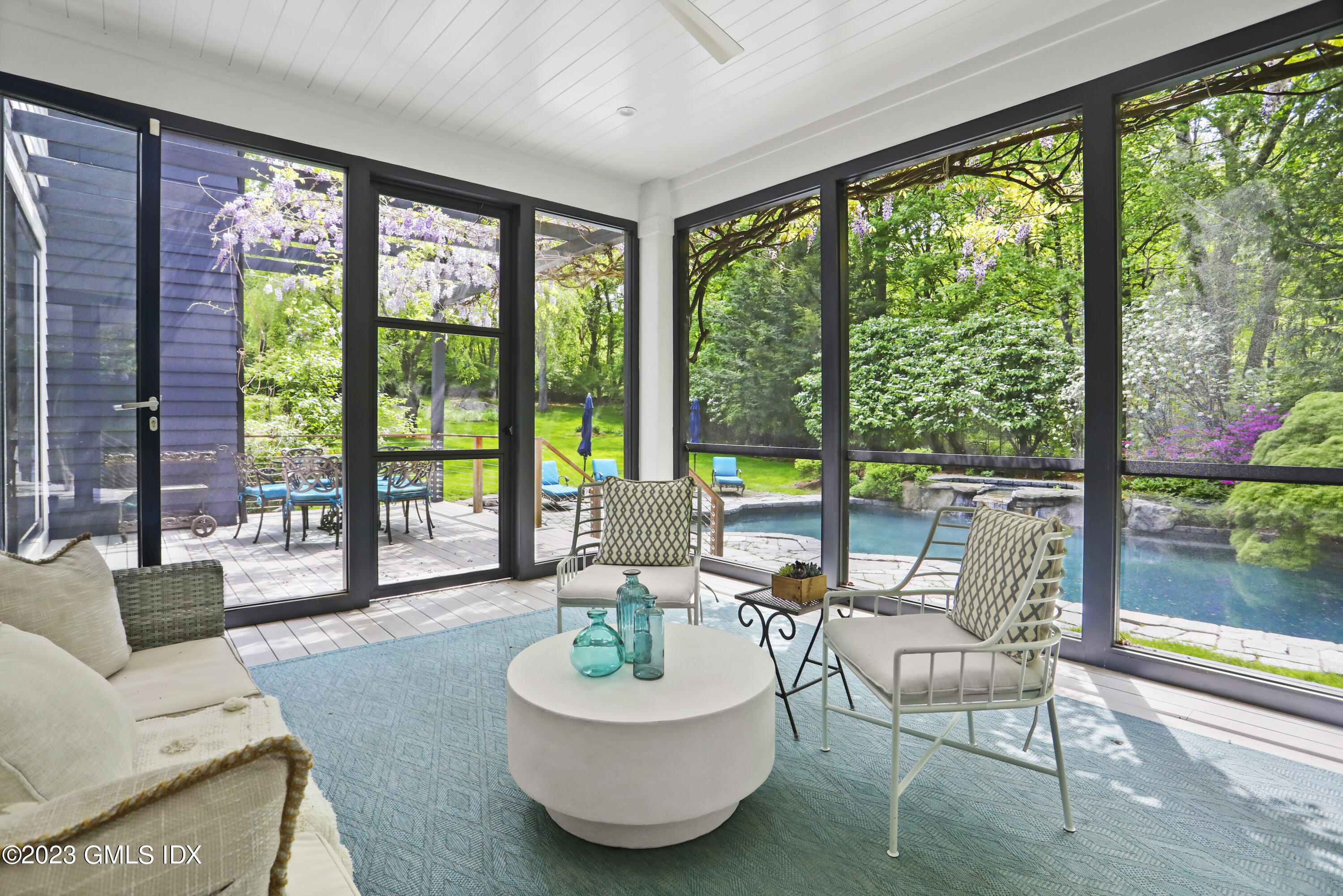 56 Dingletown Road Greenwich, CT 06830 - Photo 14 of 38 a living room with furniture and a large window