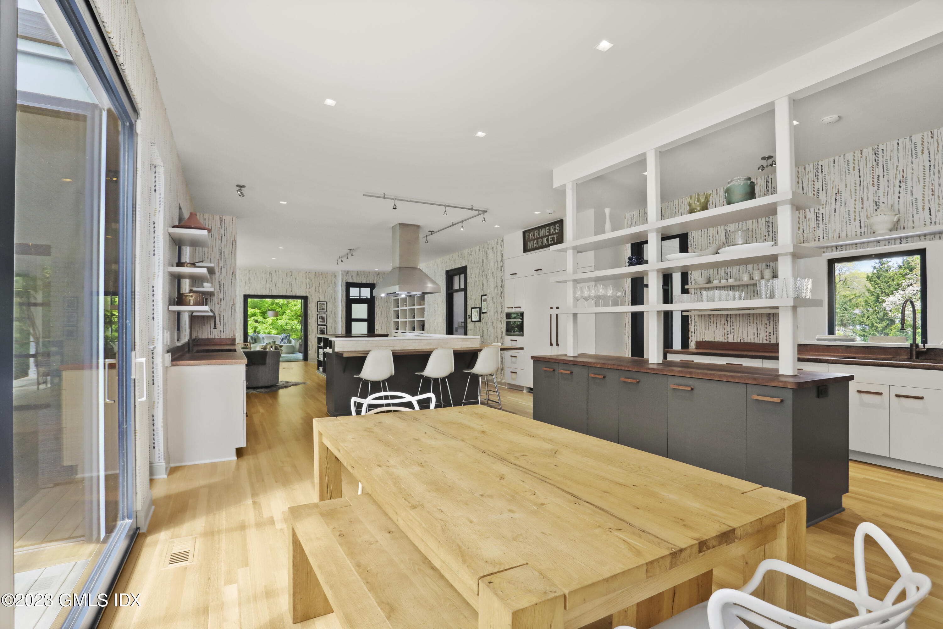 56 Dingletown Road Greenwich, CT 06830 - Photo 16 of 38 a living room with stainless steel appliances kitchen island granite countertop furniture and a rug