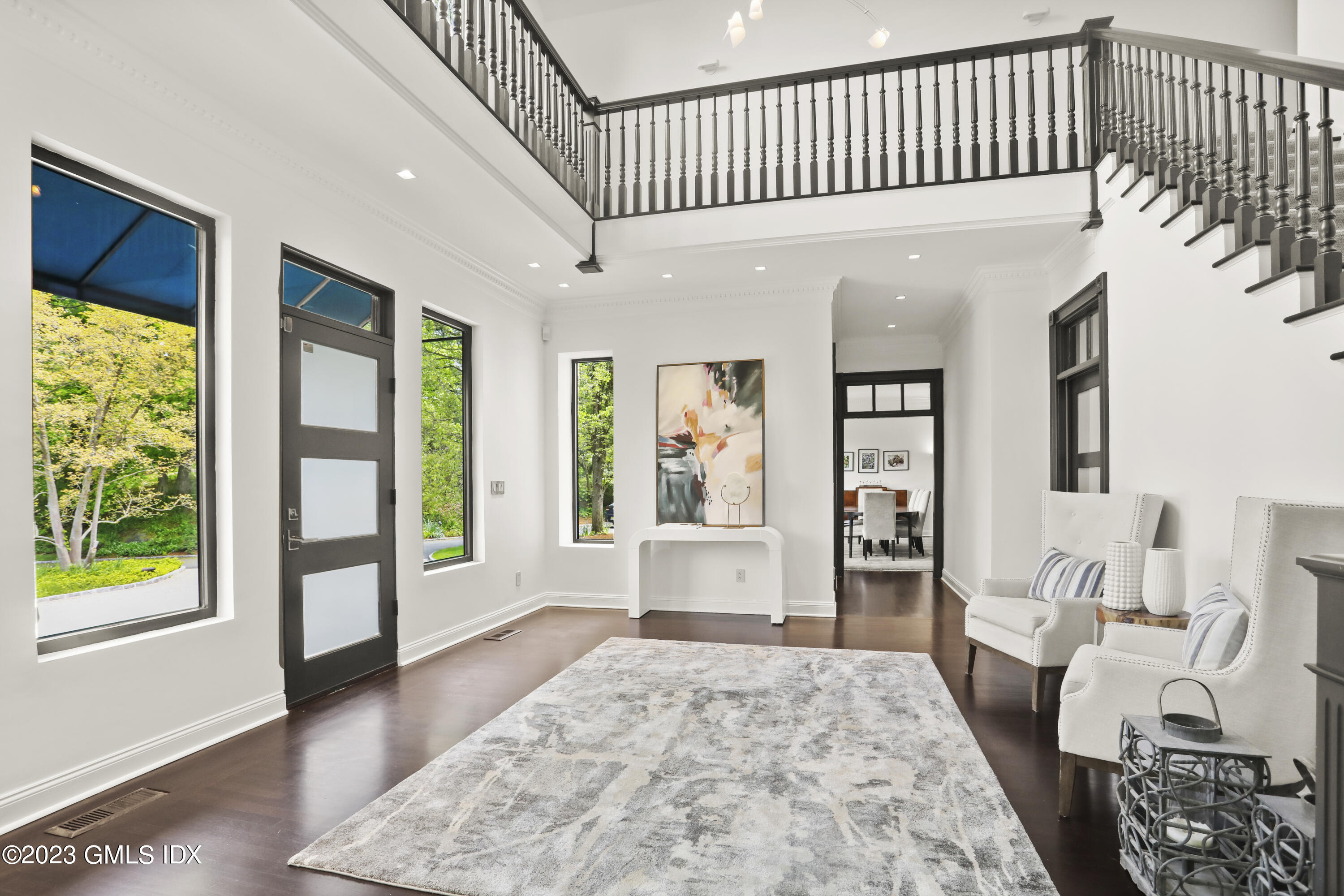 56 Dingletown Road Greenwich, CT 06830 - Photo 21 of 38 a hallway with furniture and wooden floor