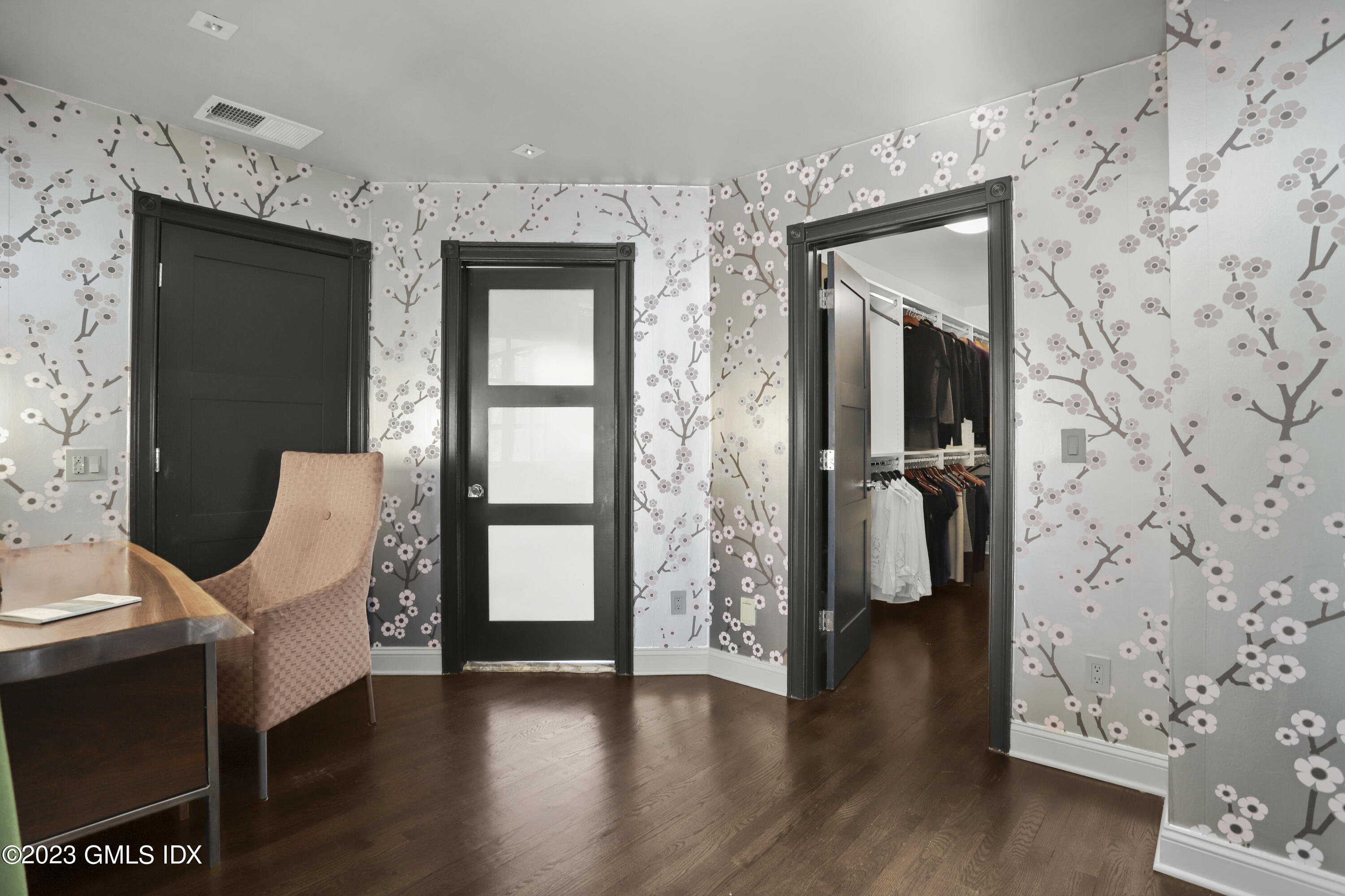 56 Dingletown Road Greenwich, CT 06830 - Photo 24 of 38 a view of a hallway with wooden floor and windows