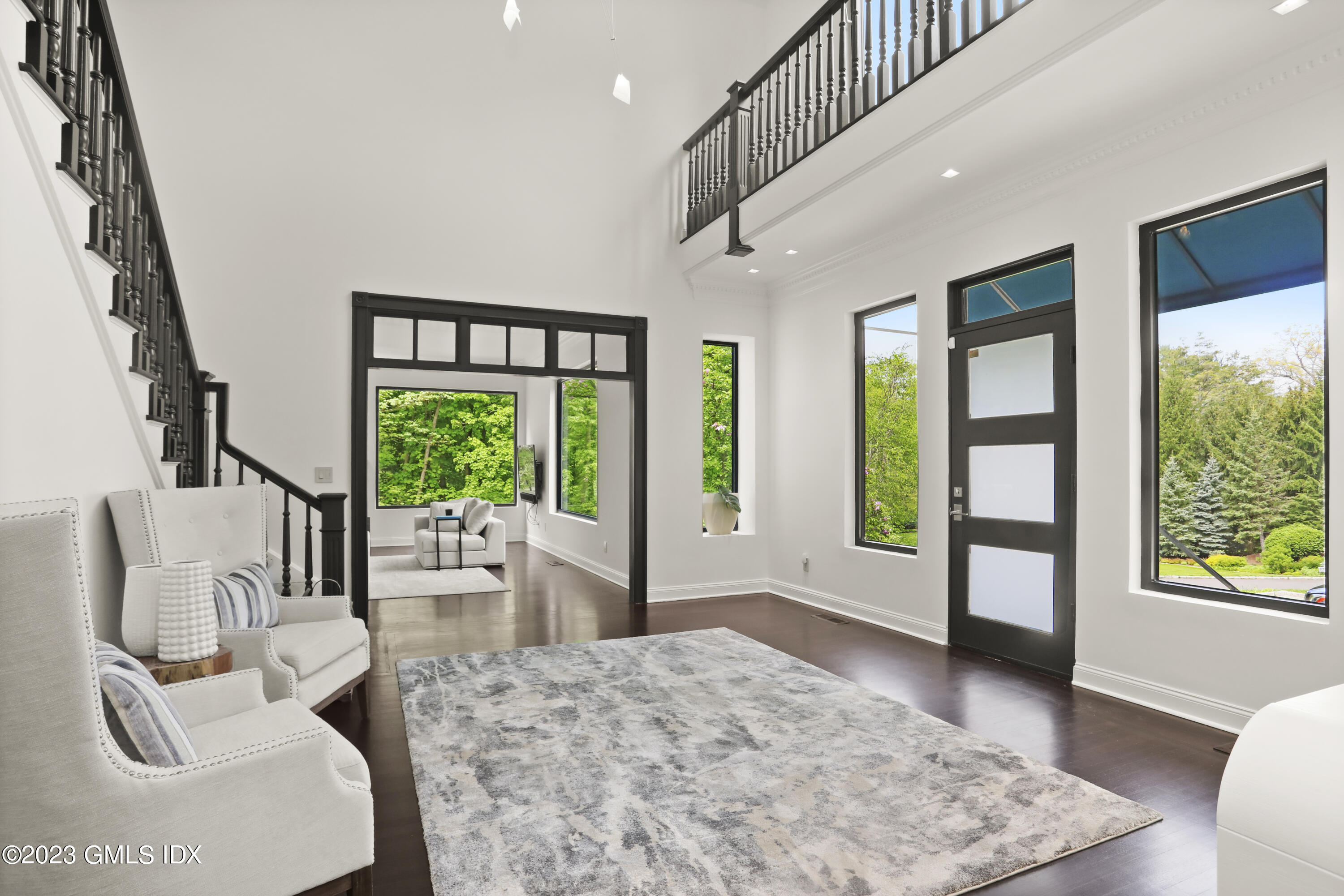 56 Dingletown Road Greenwich, CT 06830 - Photo 4 of 38 a living room with furniture and a window